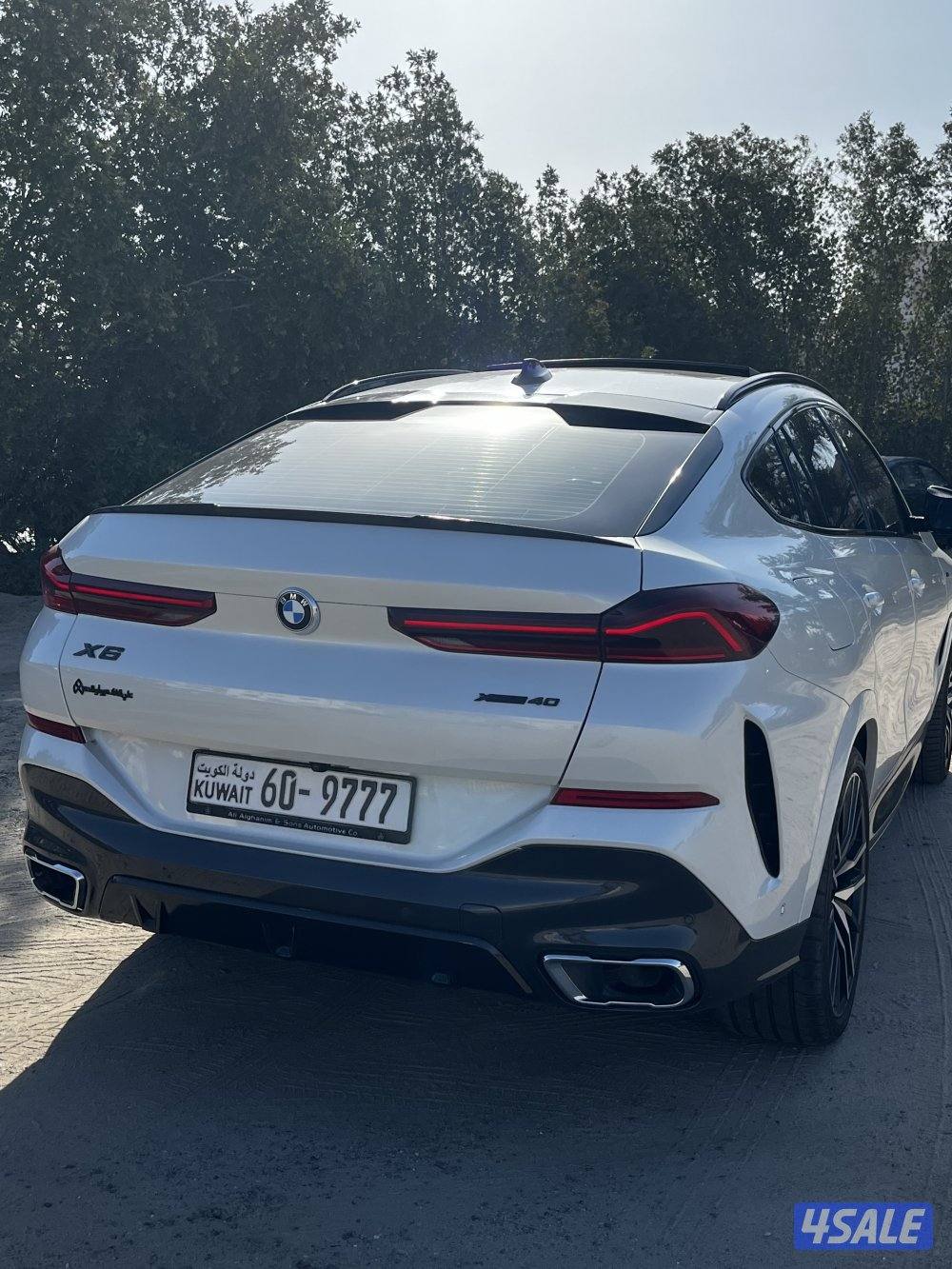 Bmw x6 2022 صبغ وكالة تأمين ذهبي شامل1