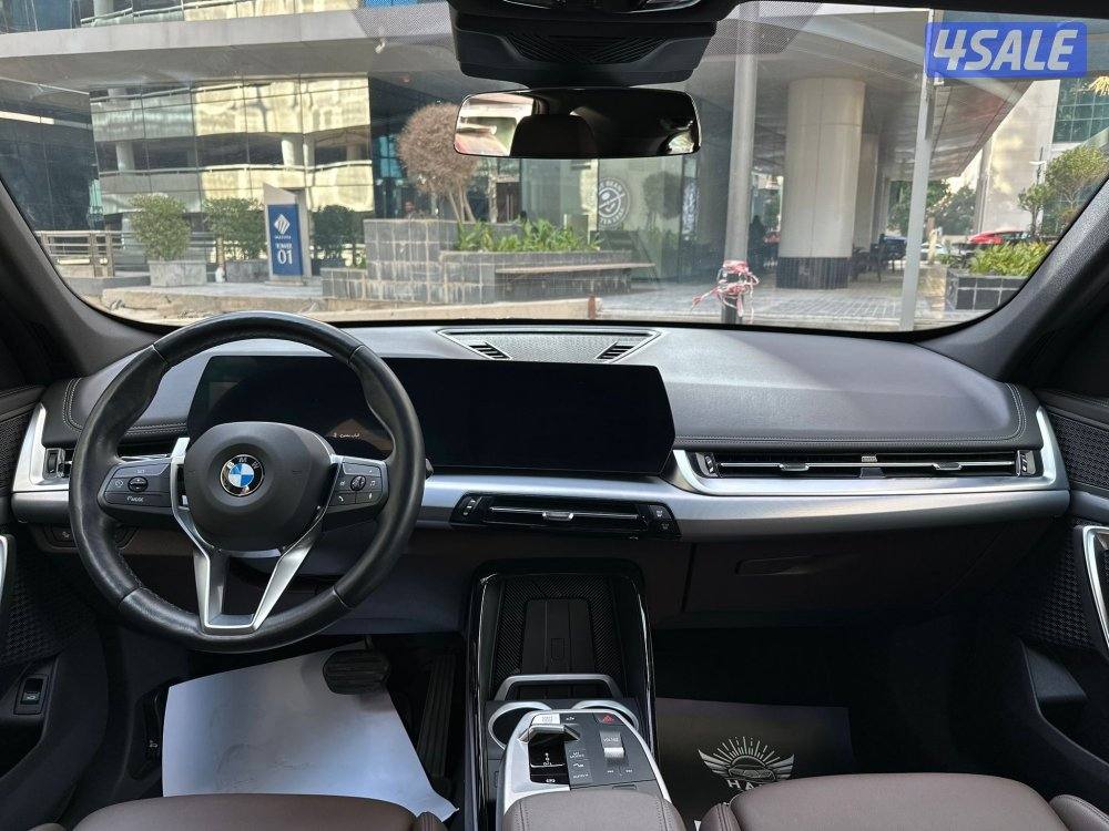 BMW X1 2023 ماشي 10 الف مالك الاول تحت الكفالة شرط الفحص بالكامل12