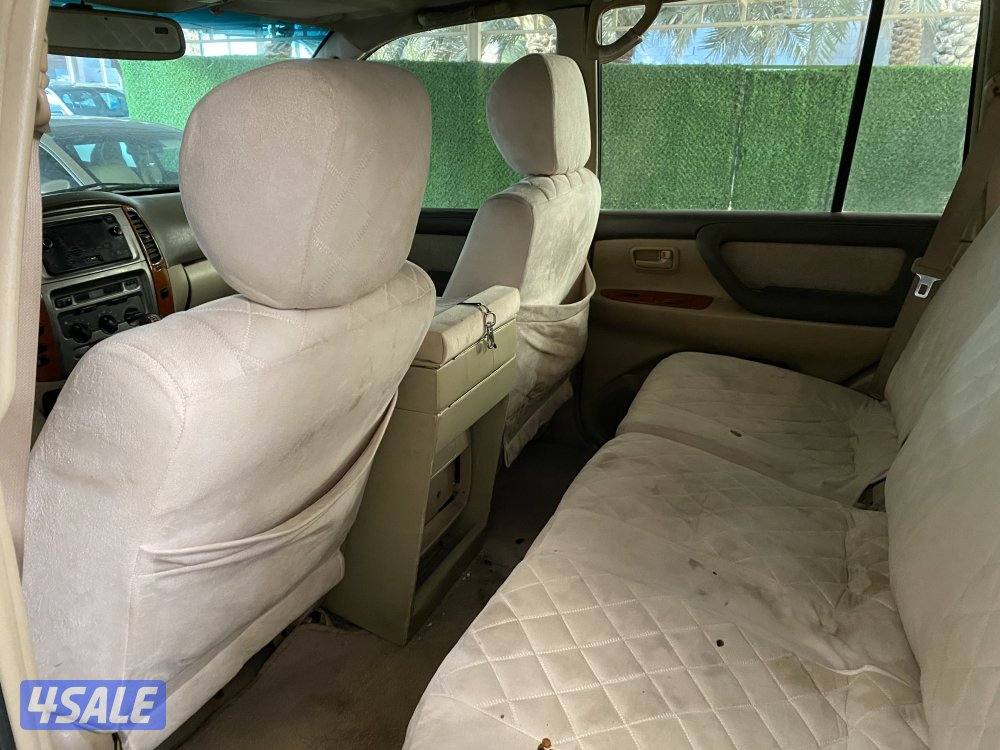 2003 بحاله جيده شاصي سليم قير عادي  ابيض من داخل بيج1