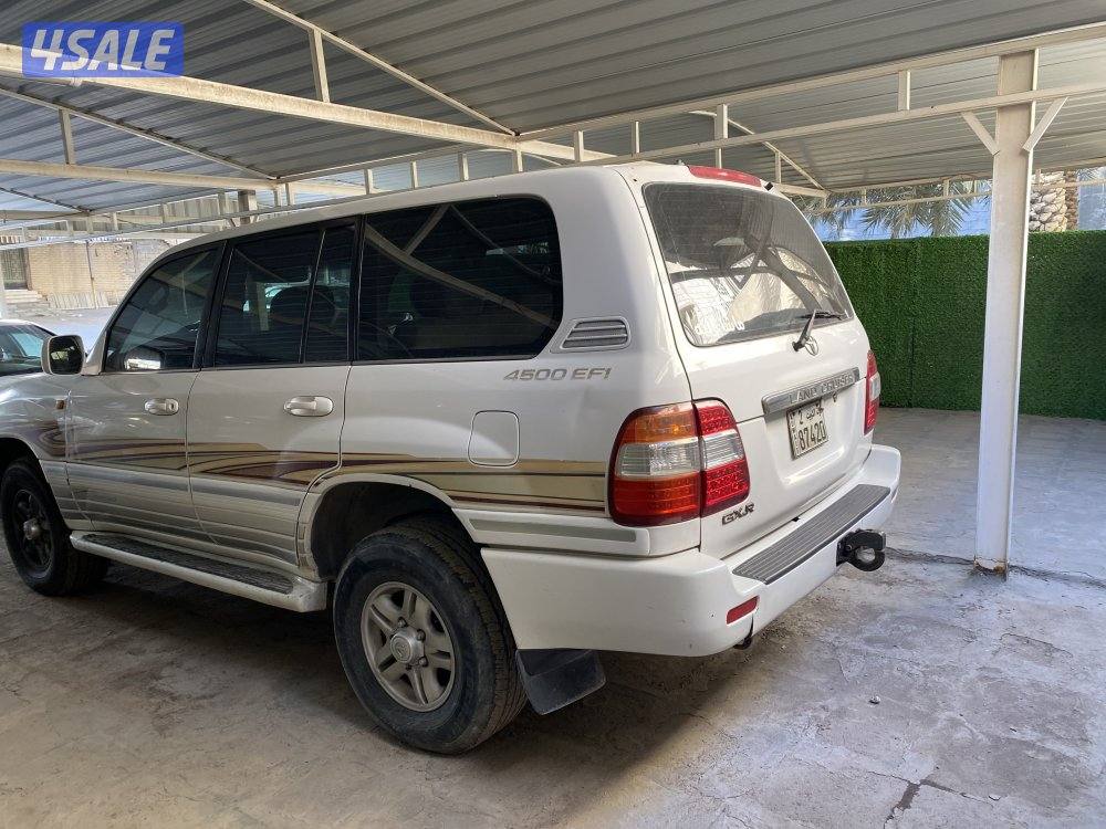 2003 بحاله جيده شاصي سليم قير عادي  ابيض من داخل بيج2