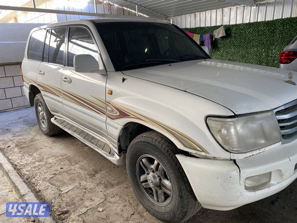 2003 بحاله جيده شاصي سليم قير عادي  ابيض من داخل بيج3