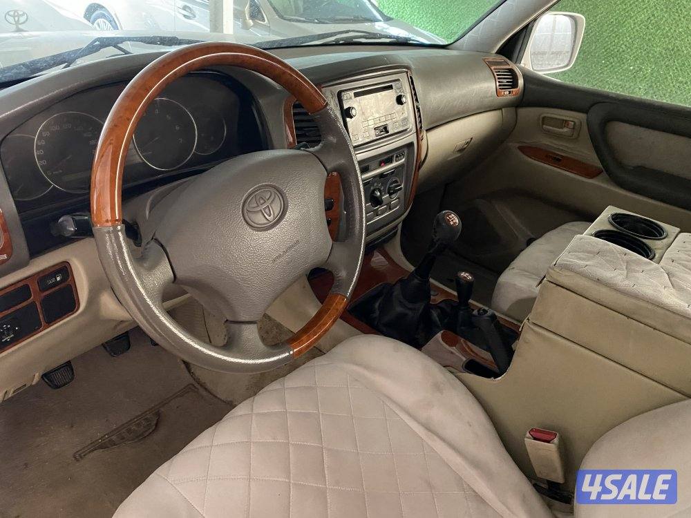 2003 بحاله جيده شاصي سليم قير عادي  ابيض من داخل بيج4