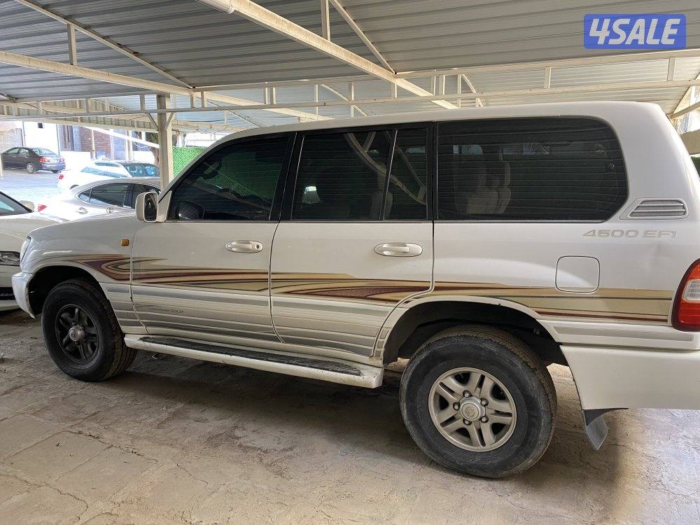 2003 بحاله جيده شاصي سليم قير عادي  ابيض من داخل بيج7