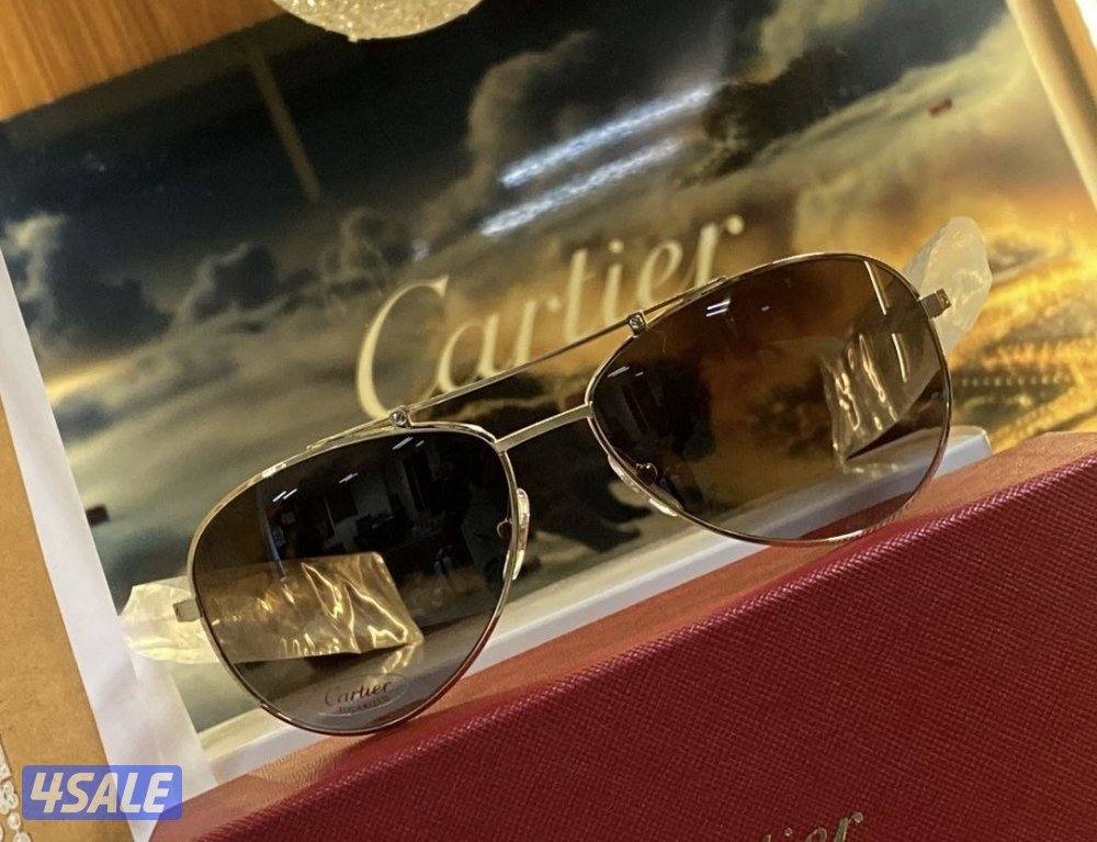 أقلام وأبواك وساعات ونظارات أصلية10