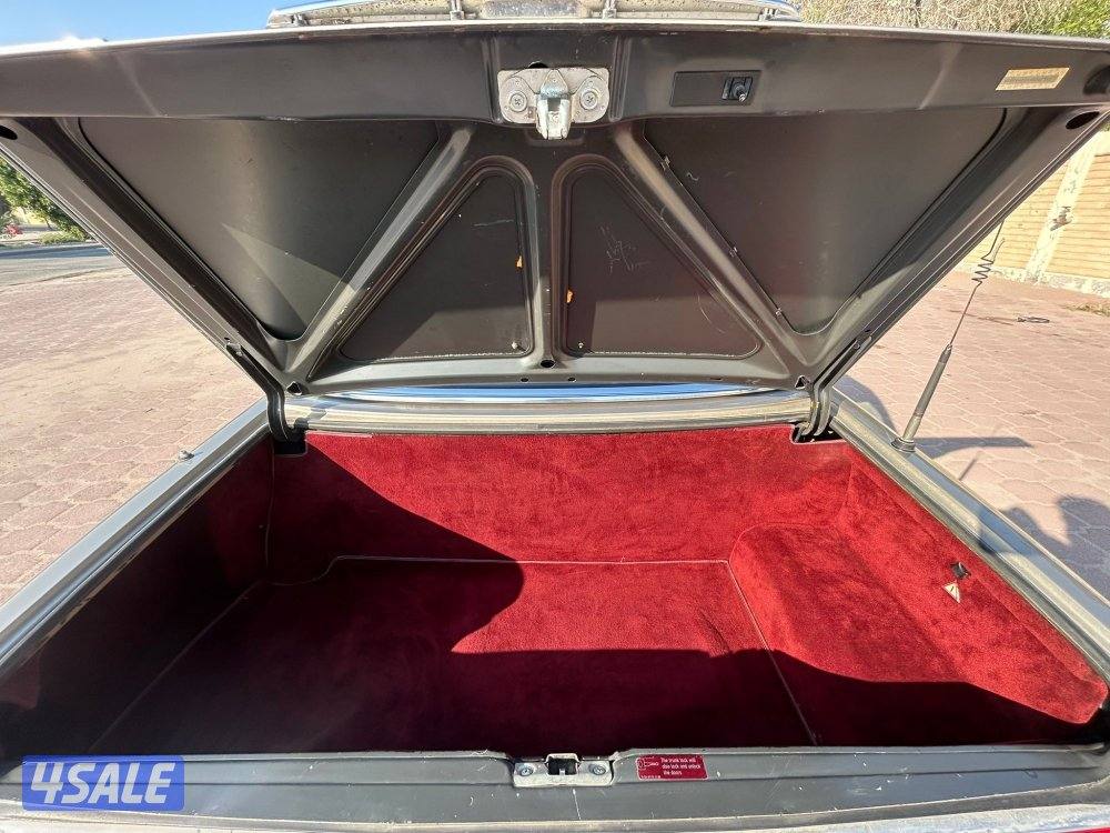 مرسيدس SL 560 موديل 1986 ماشي 106 ميل ليدور نظيف شرط الفحص14