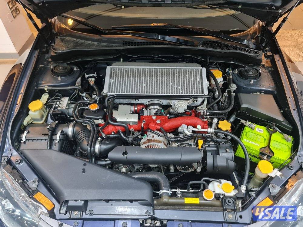 سوبارو أمبريزا STI مخزن بحالة المصنع ماشي ١٧،٠٠٠ كم9