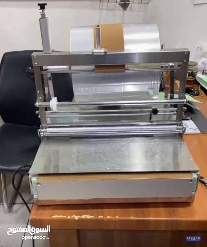 للبيع ماكينة تغليف منتجات (شبه جديدة) + الرول1