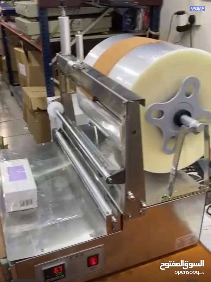 للبيع ماكينة تغليف منتجات (شبه جديدة) + الرول2