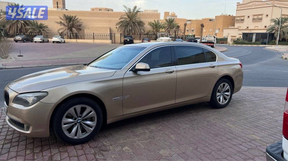 بيعه سريعه bmw 730li اللون ذهبي كاملة مواصفات1