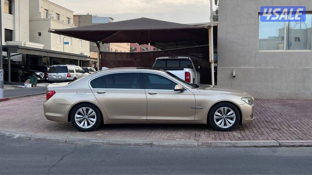 بيعه سريعه bmw 730li اللون ذهبي كاملة مواصفات2