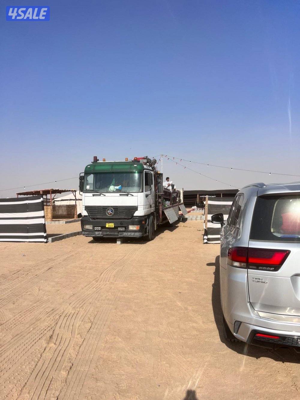 لوري كرين سطحه نقل عدات نقل شاليهات نقل مخيمات كبائن نقل اشجار1