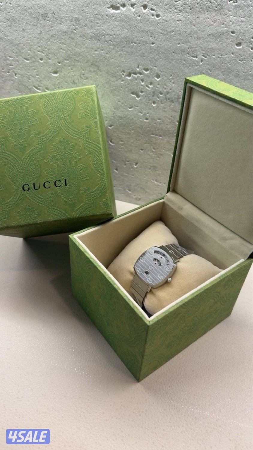 ساعة قوتشي اصلية يديدة0