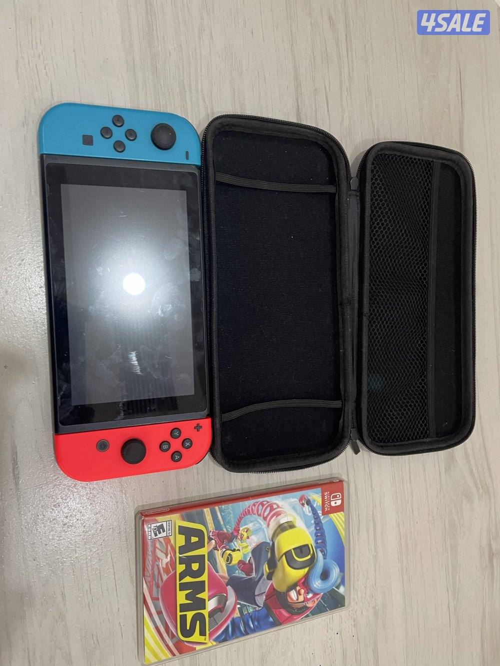 Nintendo Switch مع لعبة ARMS + شنطة + كامل الإكسسوارات0