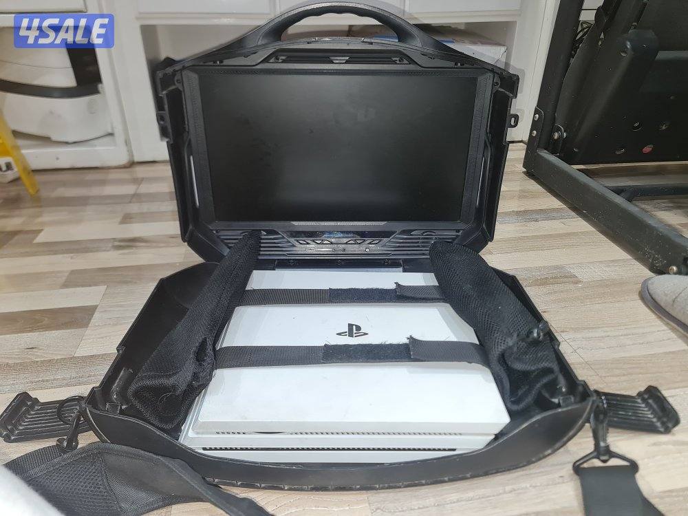 PS4 Pro 890 gb with travelling case and controller0