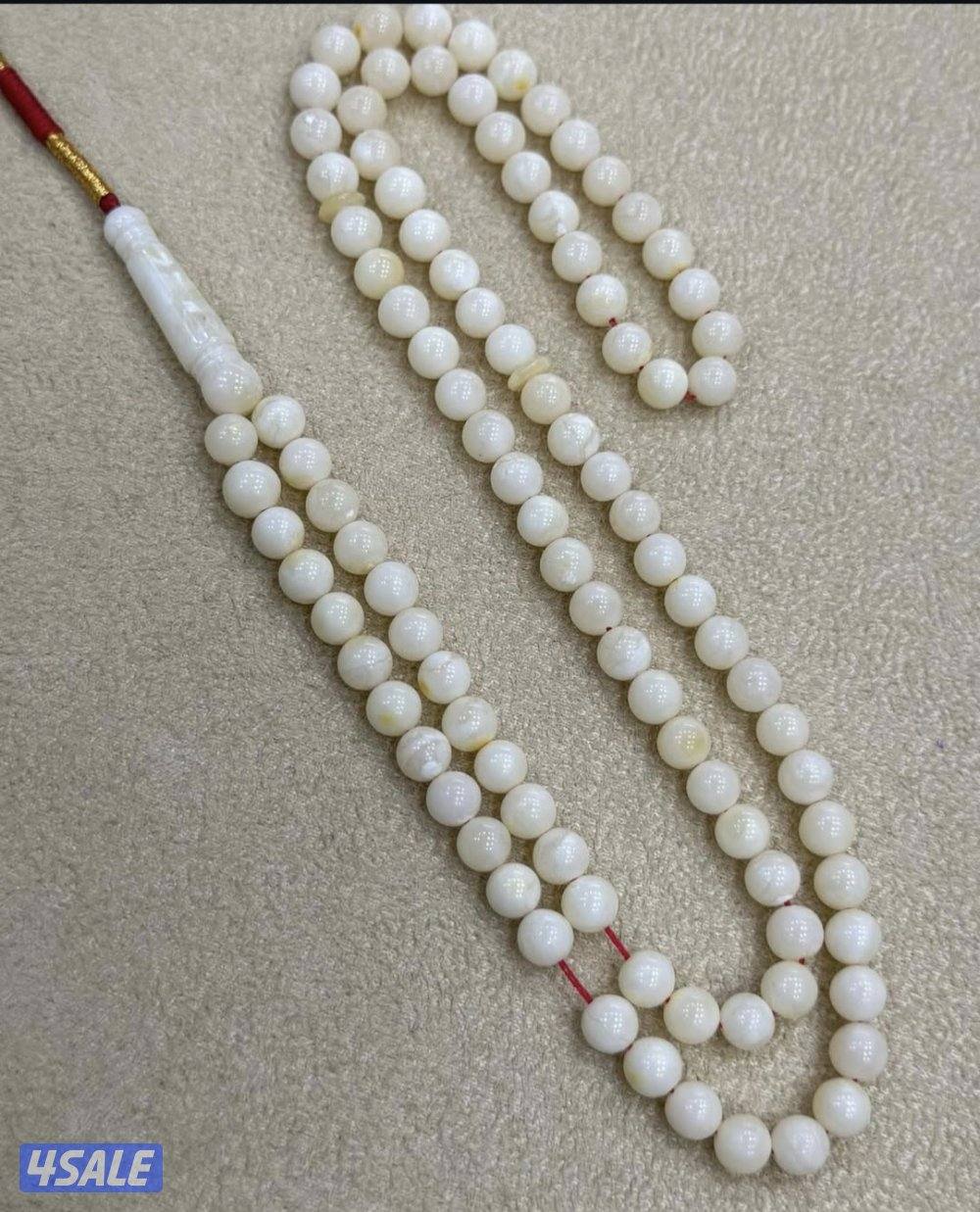 كهرب ابيض ٩٩ خرزه0