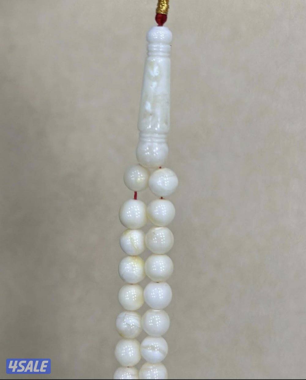 كهرب ابيض ٩٩ خرزه1