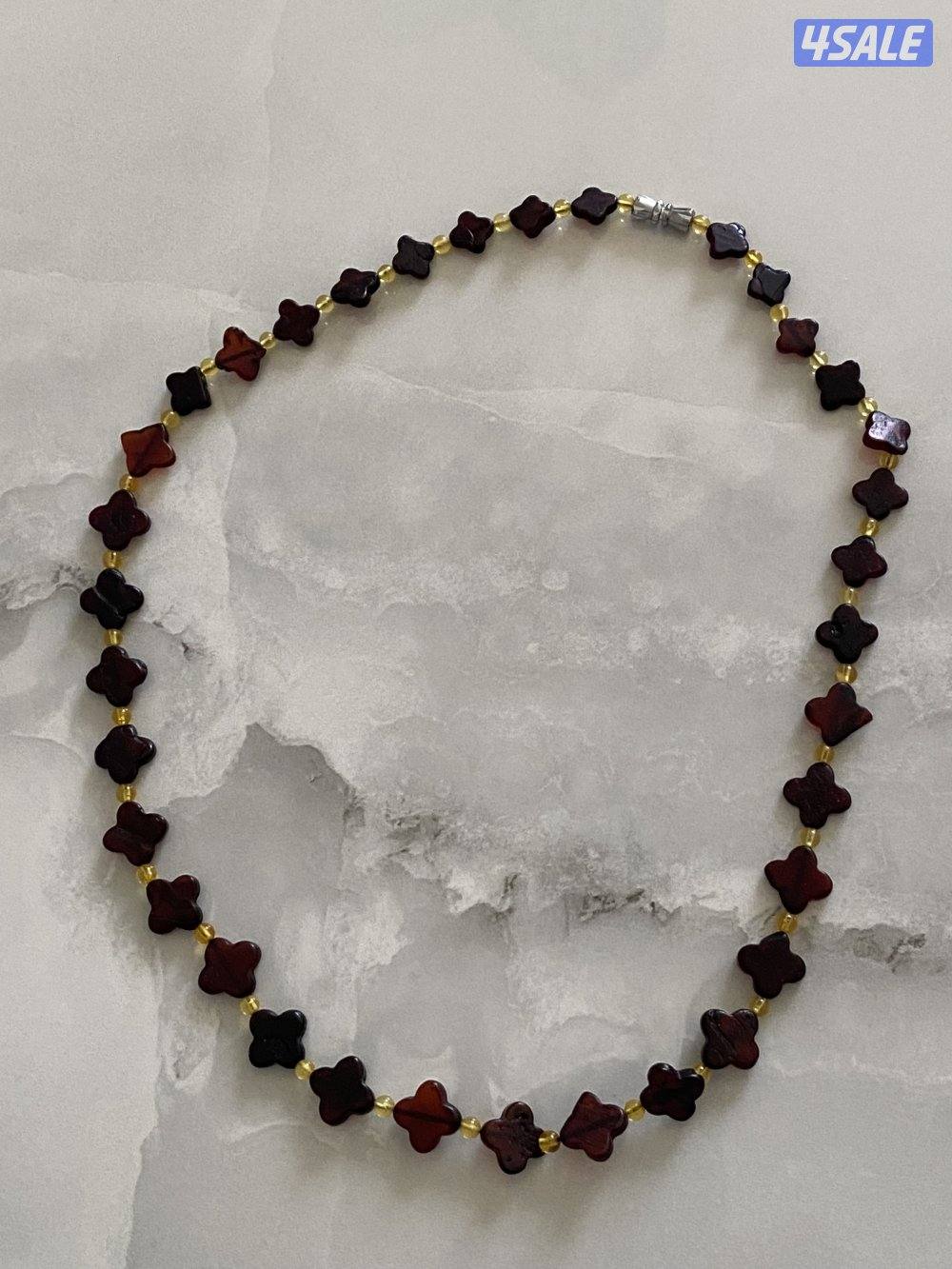 للبيع مسباحين و٨ عقود و٣ أساور كهرب5