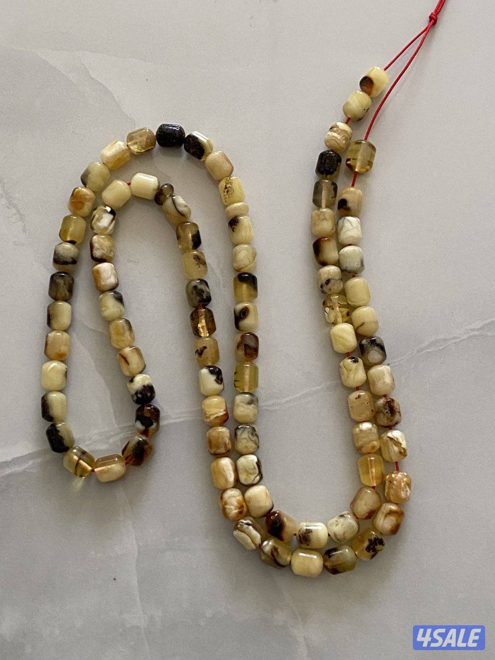 للبيع مسباحين و٨ عقود و٣ أساور كهرب6