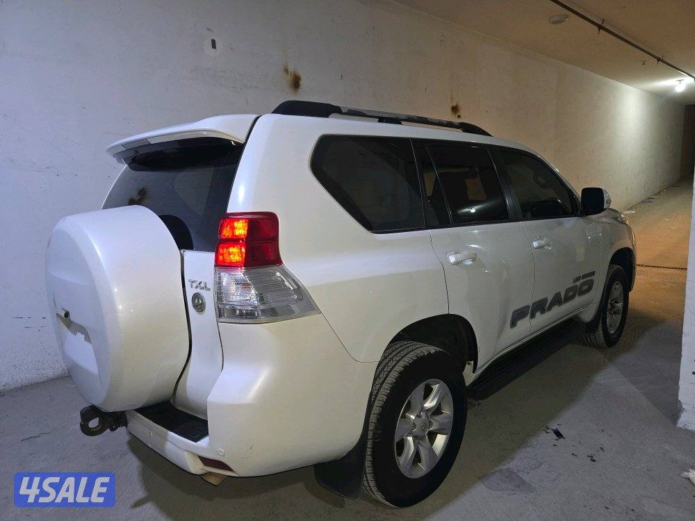 تويوتا برادو TXL موديل 2013  ما عدا الفتحه والشاشة شرط الفحص1