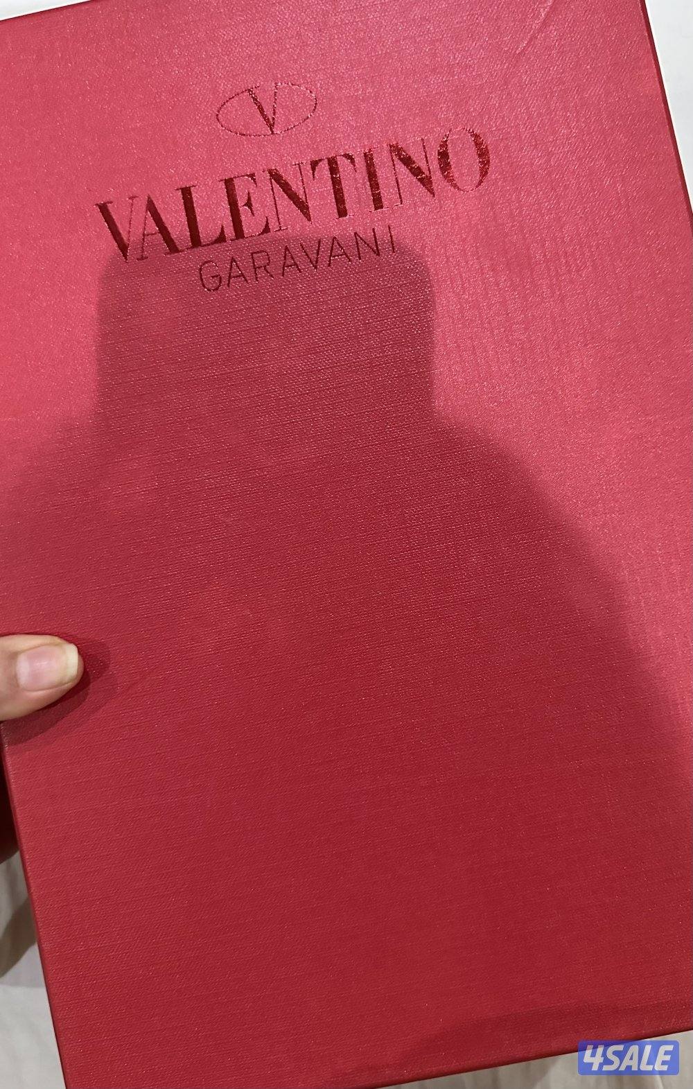 Brand new heels maroon or burgundy Valentino brand . With all acc4