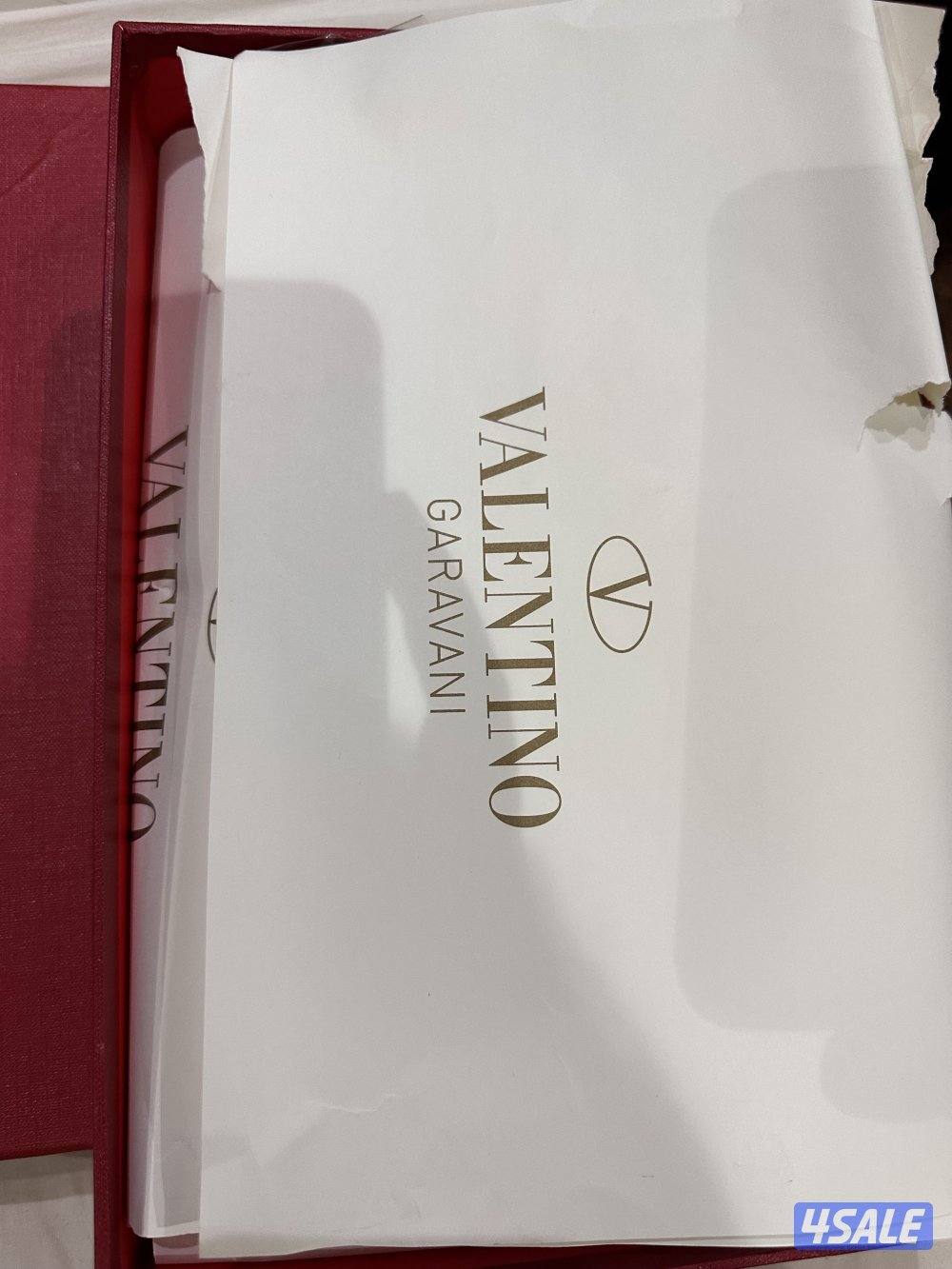 Brand new heels maroon or burgundy Valentino brand . With all acc5