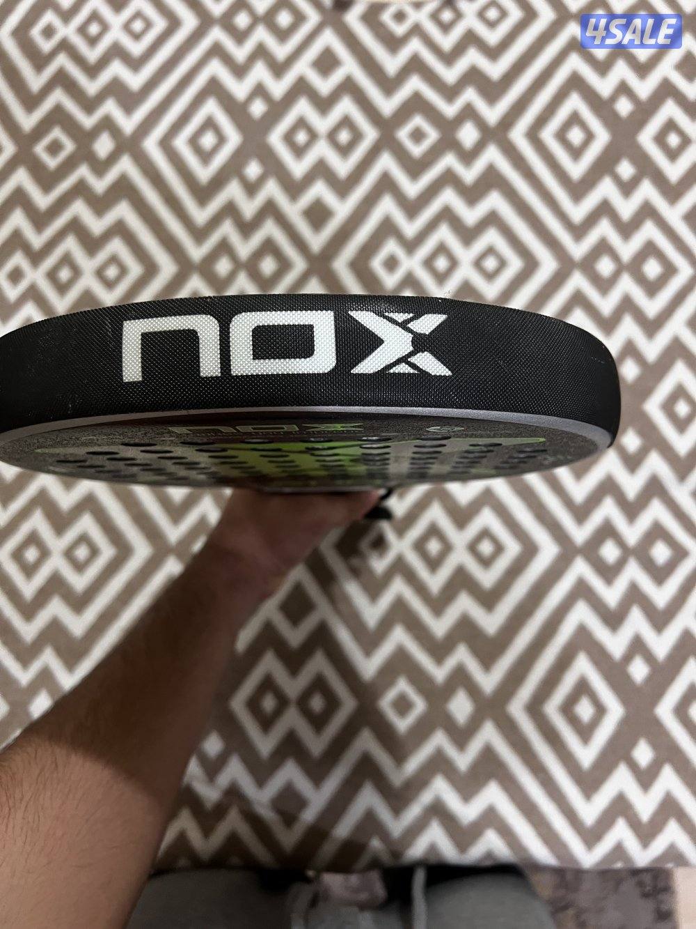 Padel Racket Bullpadel and NOX7