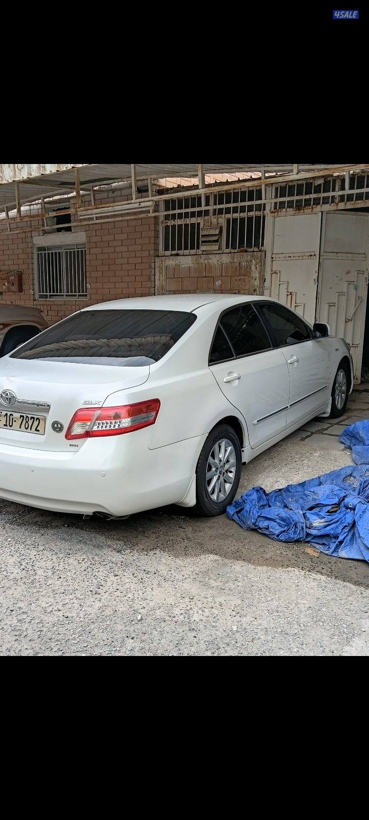 كامري 2010 ابيض صدفي glx1