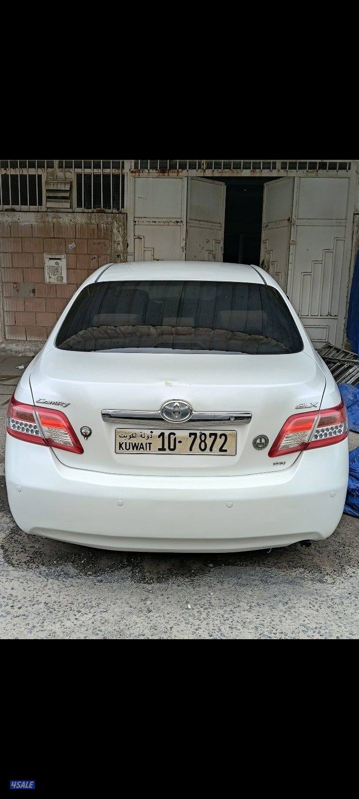 كامري 2010 ابيض صدفي glx2