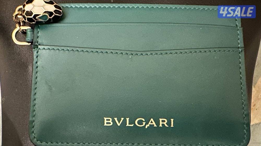 ‏للبيع محفظة/كارد هو لدرBVLGARI اصلية لون أخضر بحالة ممتازة نظيفة0