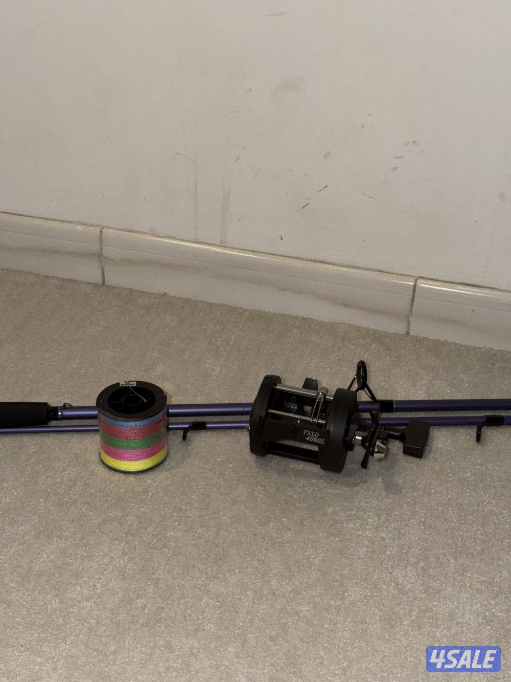 سنارة ومكينة trolling وخيط 32 kg4