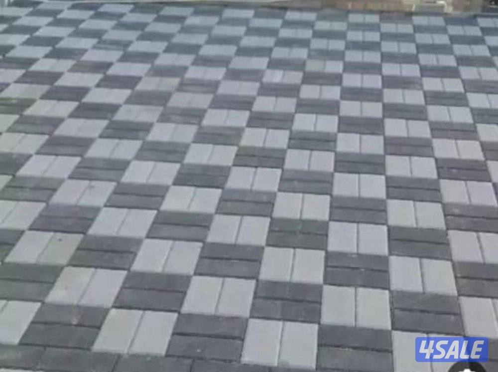 معلم بلاط متداخل وبني كربستون وتنسيق حدائق0