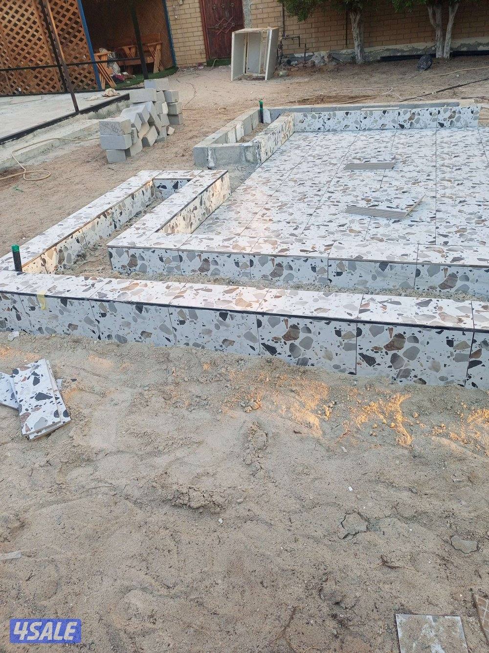 معلم بلاط متداخل وبني كربستون وتنسيق حدائق2