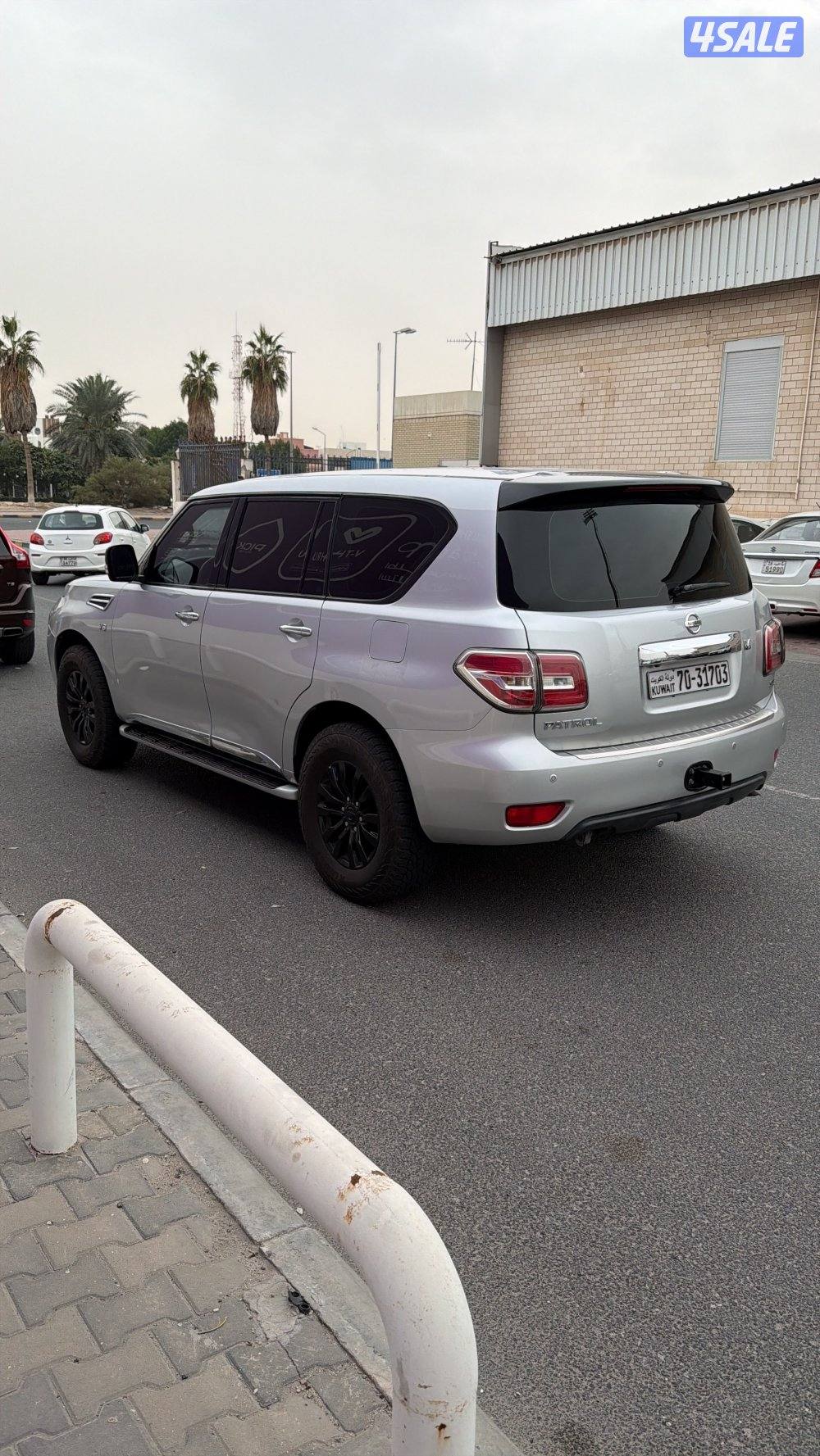 للبيع باترول SE موديل ٢٠١٤ ماشي ١٩٩ لونه سلڤر ومن الداخل بيج شرط الفحص1