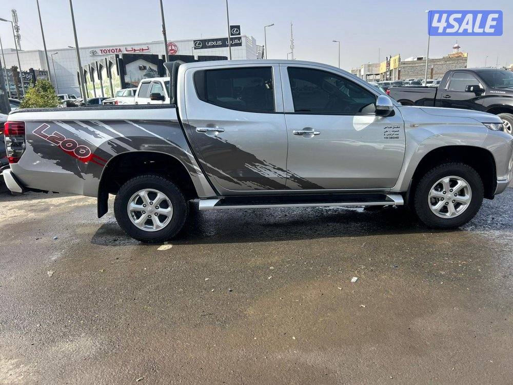 ميتسوبيشى L200 موديل 2022 ماشى 81.000 k.m  وارد الملا . صبغ وكالة2