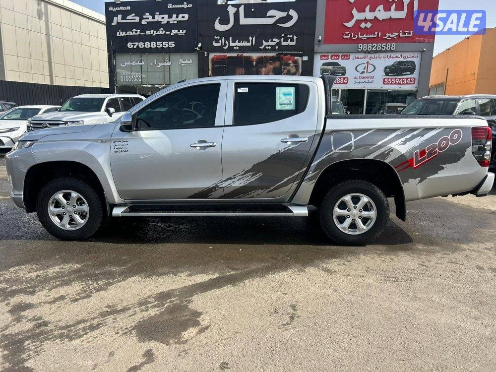 ميتسوبيشى L200 موديل 2022 ماشى 81.000 k.m  وارد الملا . صبغ وكالة3