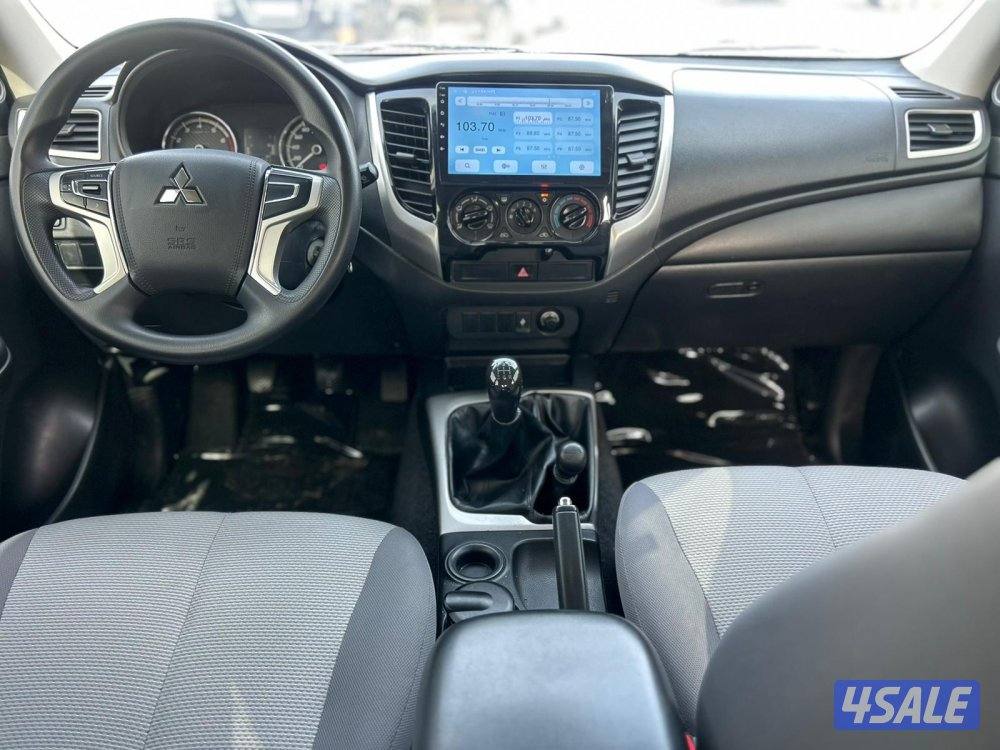 ميتسوبيشى L200 موديل 2022 ماشى 81.000 k.m  وارد الملا . صبغ وكالة6