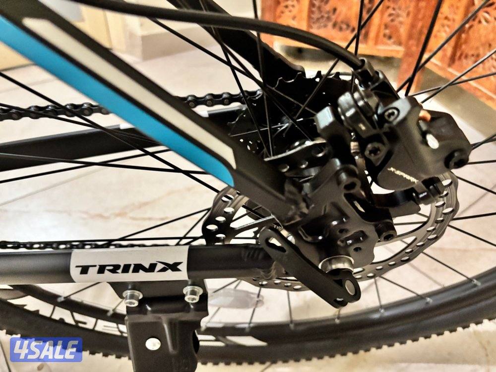 🚲 بسكليت TRINX M600 PRO جديد 100% – بريكات زيت7