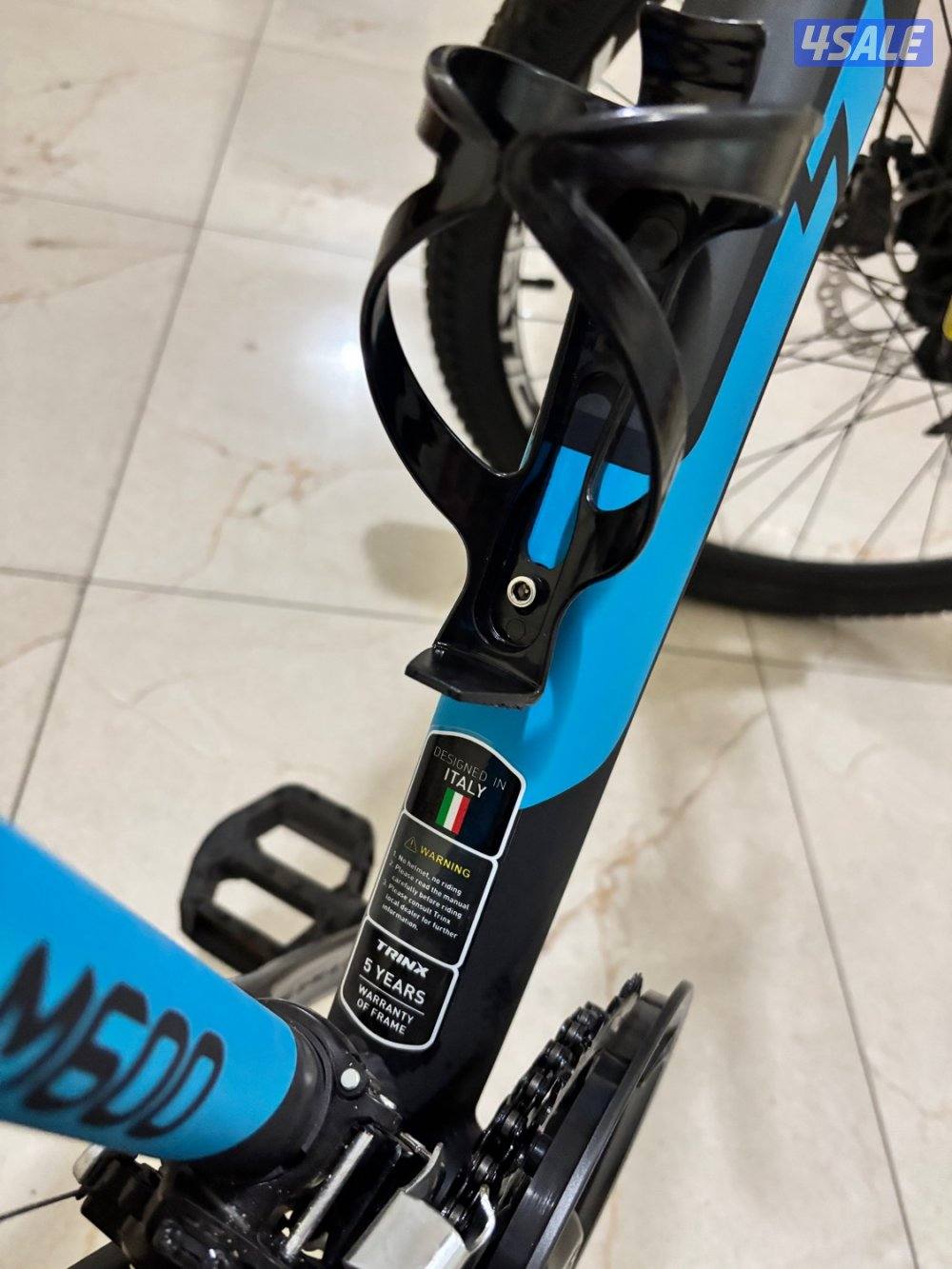 🚲 بسكليت TRINX M600 PRO جديد 100% – بريكات زيت10