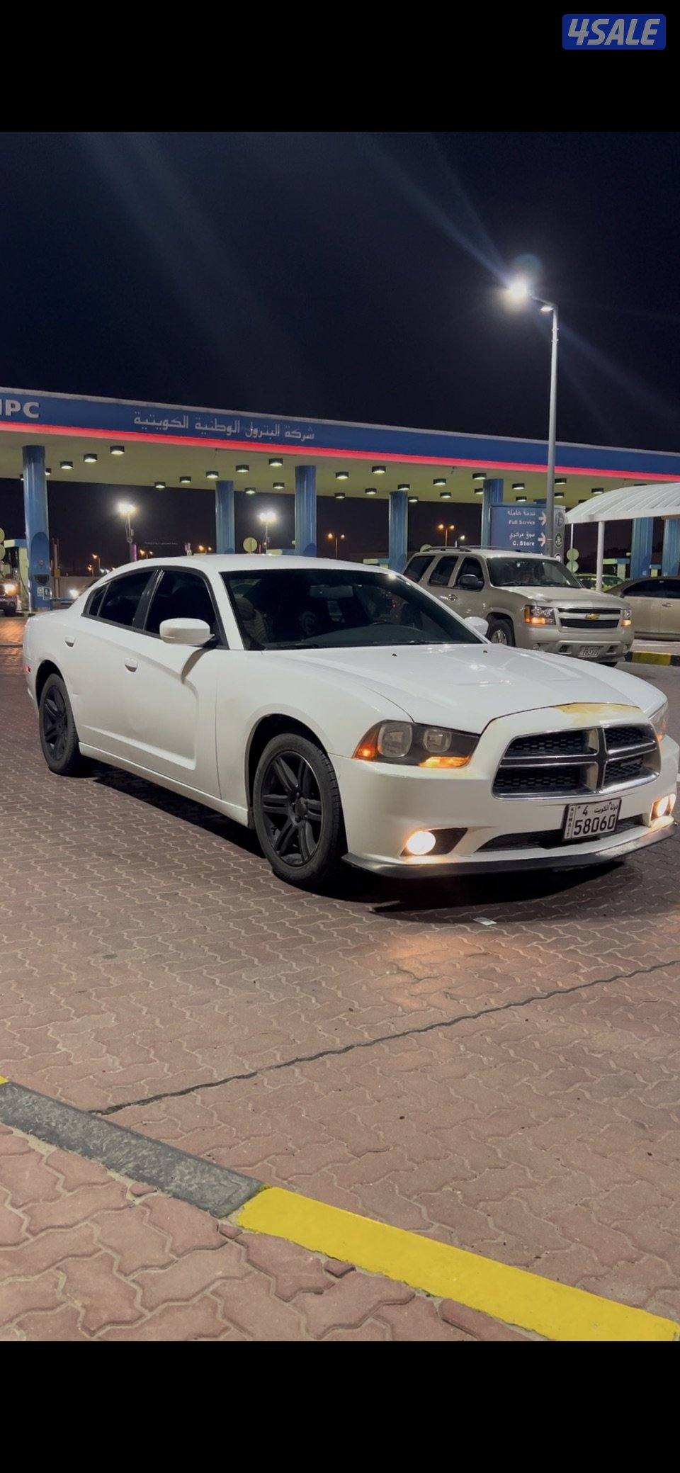 دوج شارجر 2014 ماشي 203 صبغ وكاة 6 سلندر بحالة ممتازة جدا شرط الفحص0