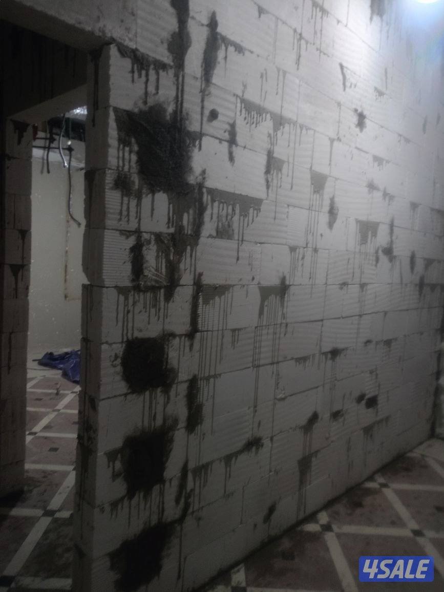 المعلم خليفه ترميمات توسيع تكسير مباني مساحة عازل جتروف بلاط متداخل1