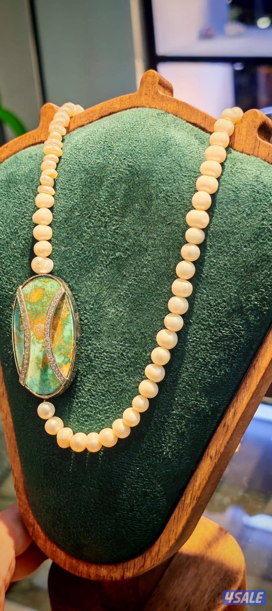 عقود لؤلؤ مميزة ، مع اكسسوارت، او احجار طبيعية.6