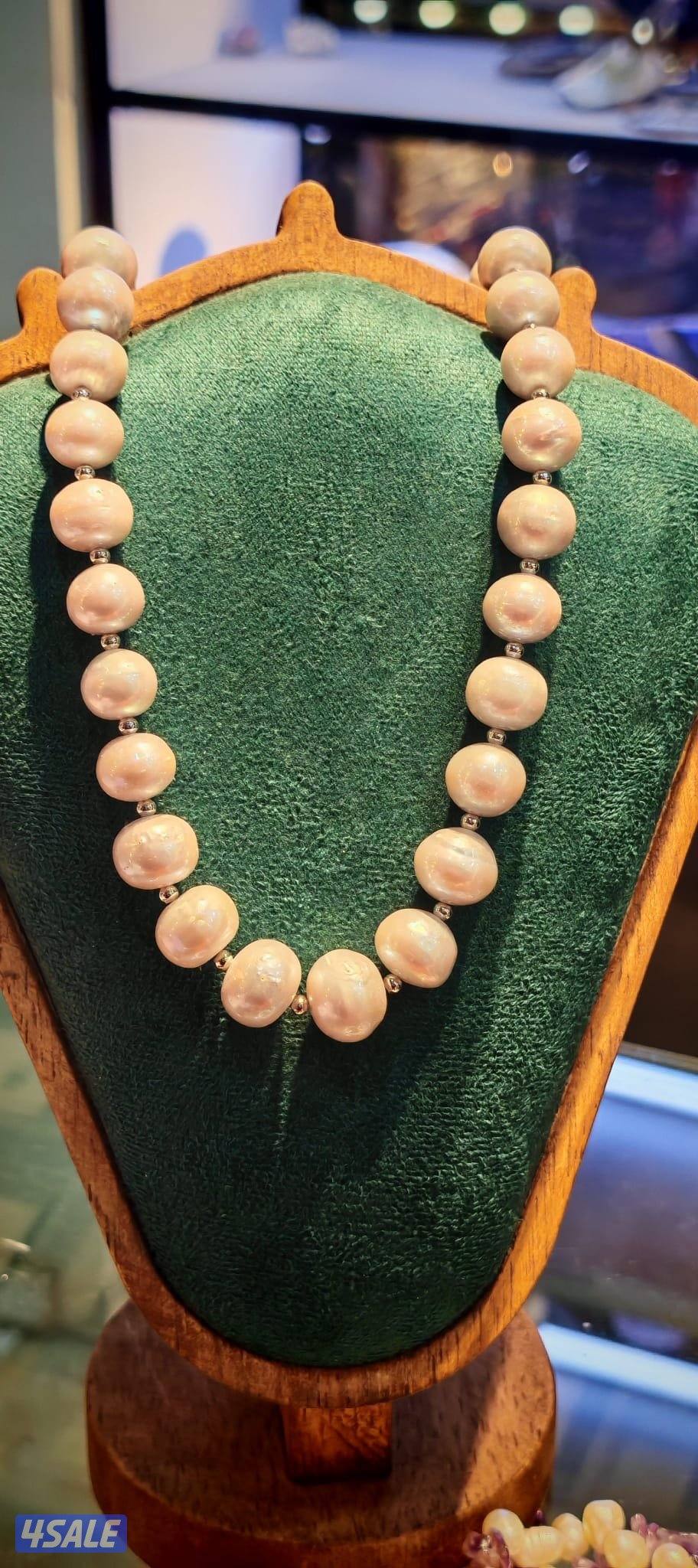 عقود لؤلؤ مميزة ، مع اكسسوارت، او احجار طبيعية.5