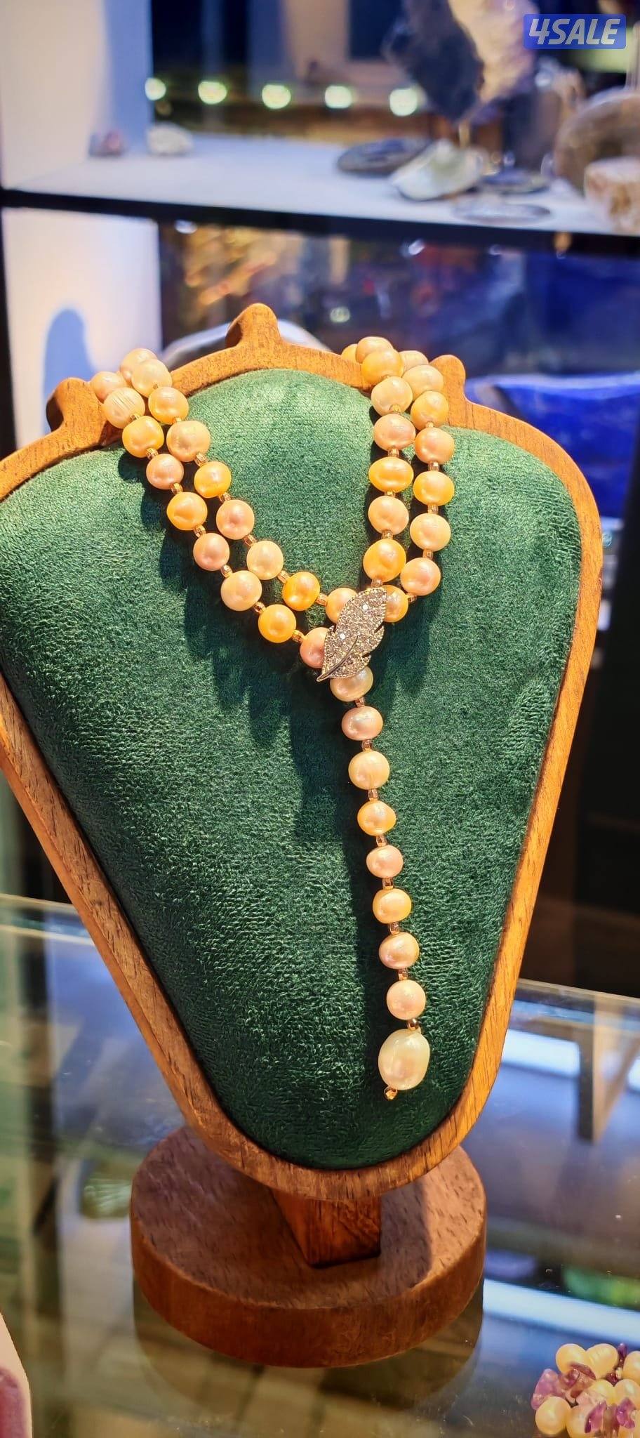 عقود لؤلؤ مميزة ، مع اكسسوارت، او احجار طبيعية.7