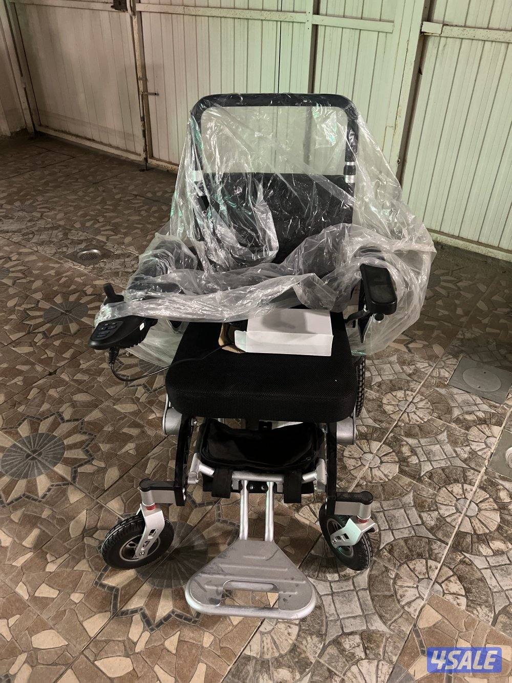 كرسي متحرك0