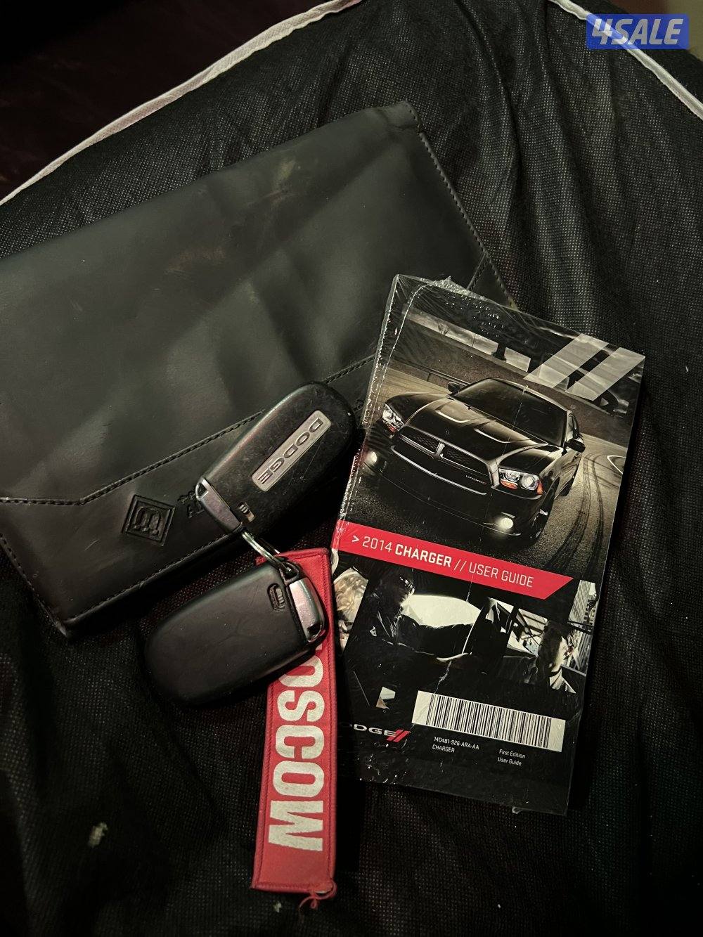 دوج شارجر 2014 ماشي 203 صبغ وكاة 6 سلندر بحالة ممتازة جدا شرط الفحص4