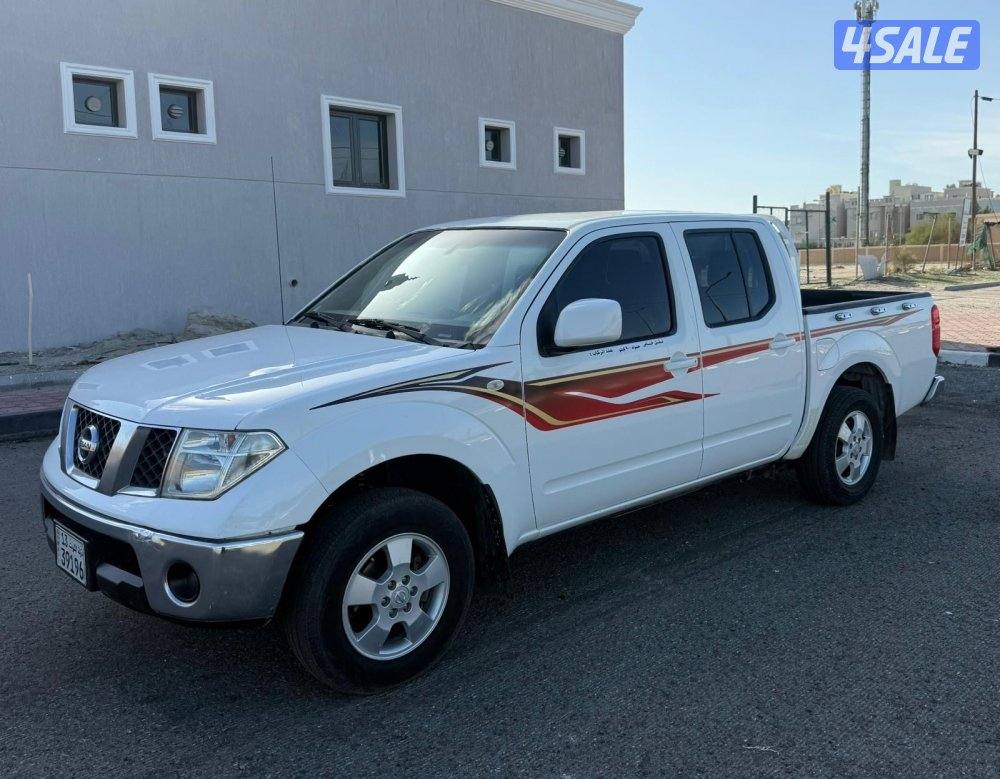 وانيت نافارو 2015 جير عادي صبغ وكاله ماعدا قطعه1