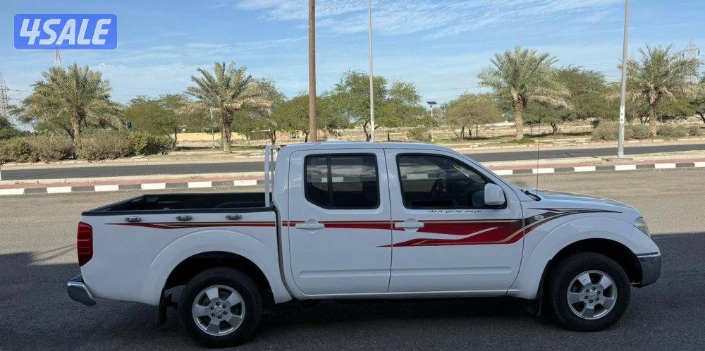 وانيت نافارو 2015 جير عادي صبغ وكاله ماعدا قطعه7