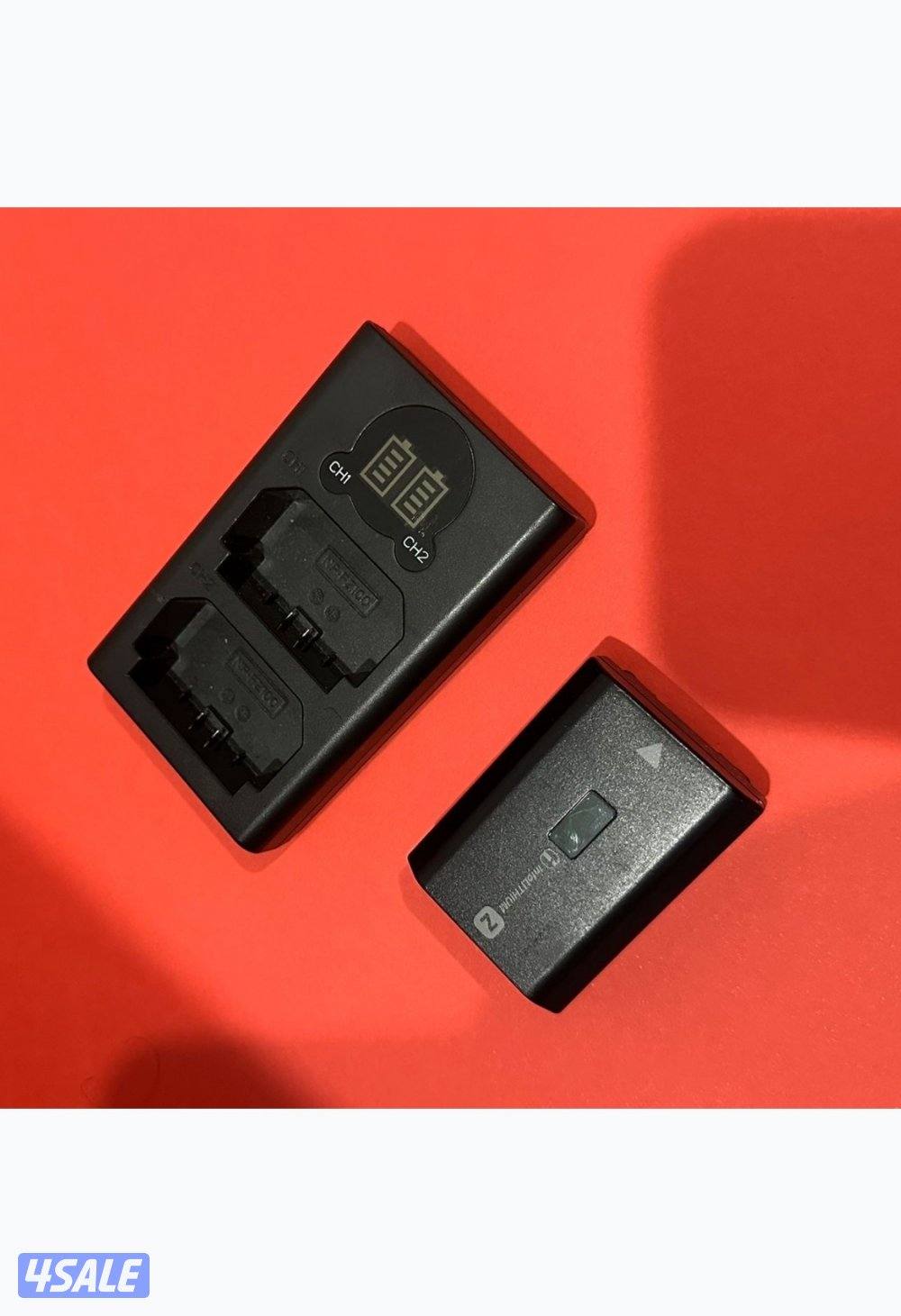 للبيع بطاريه سونى مع قاعده شحن0