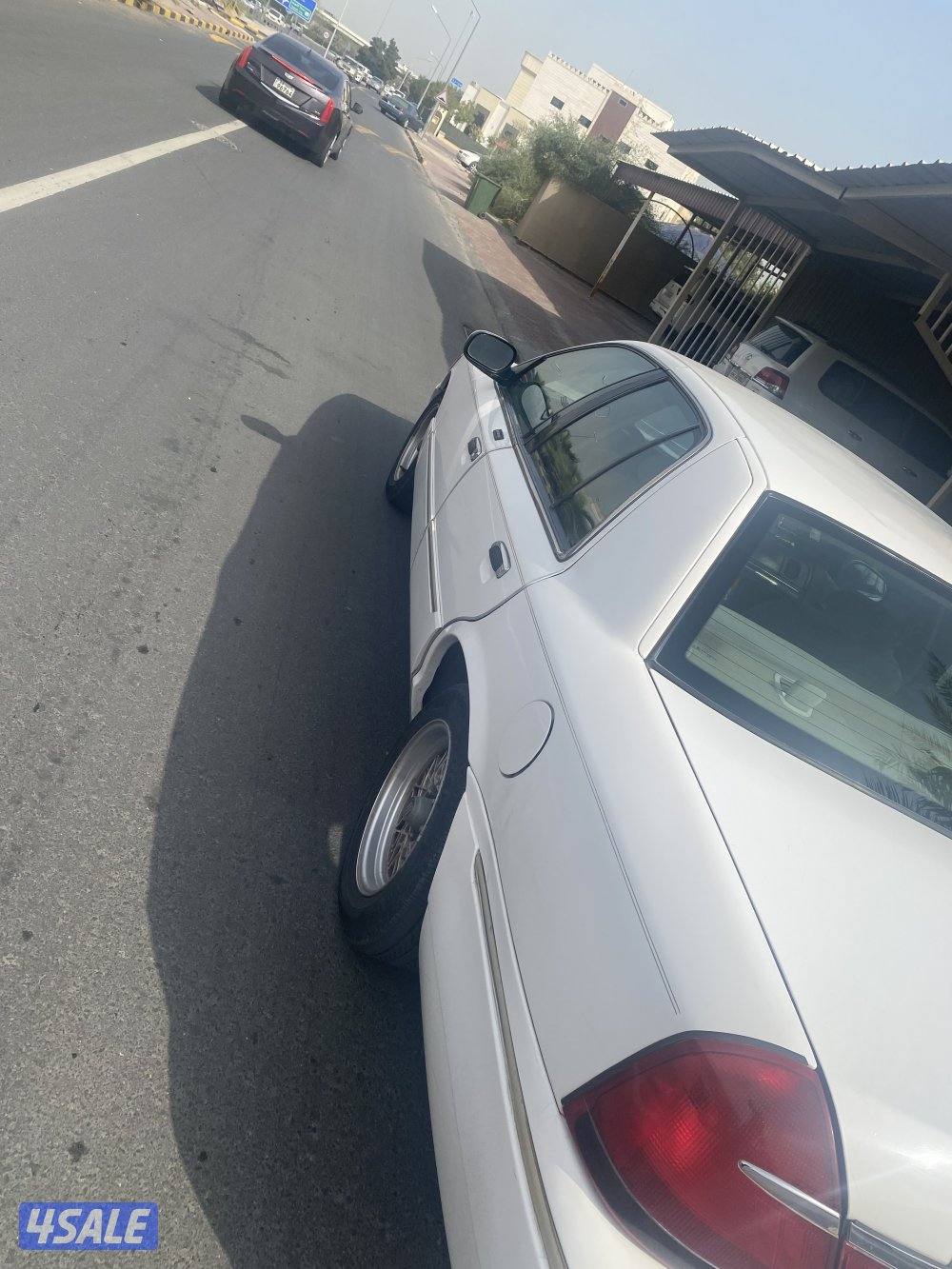 فورد جراند ماركيز  صبغ الوكاله خالي من الحوادث  ماشي 303 الف2