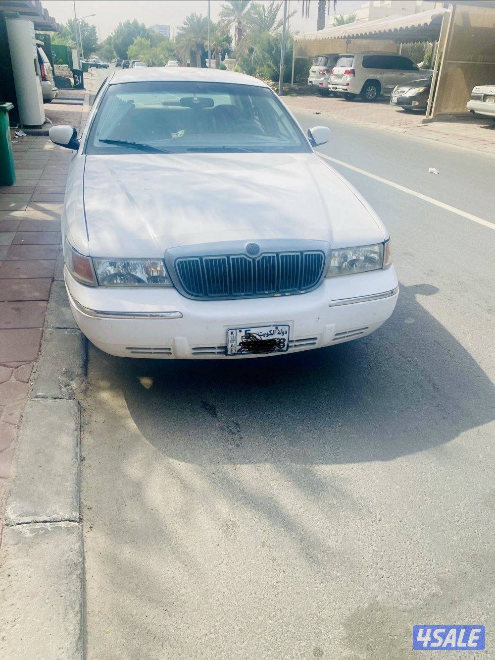 فورد جراند ماركيز  صبغ الوكاله خالي من الحوادث  ماشي 303 الف7